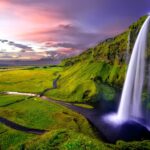 time lapse photography of waterfalls during sunset